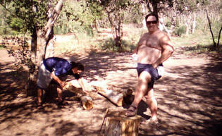 Eddy works while Michael poses.