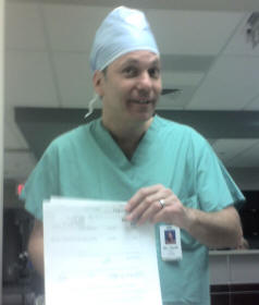 Michael's urologist, looking entirely too happy to be performing the procedure.