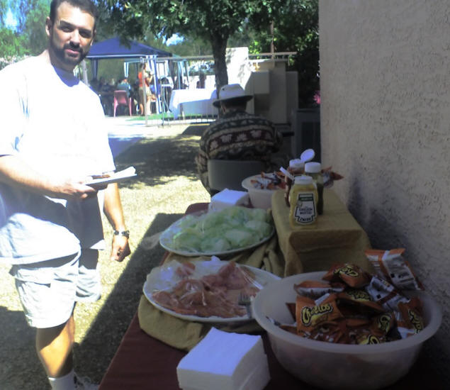The condiment table had everything one might want except mayonnaisse. No, I don't know who the cute guy is!