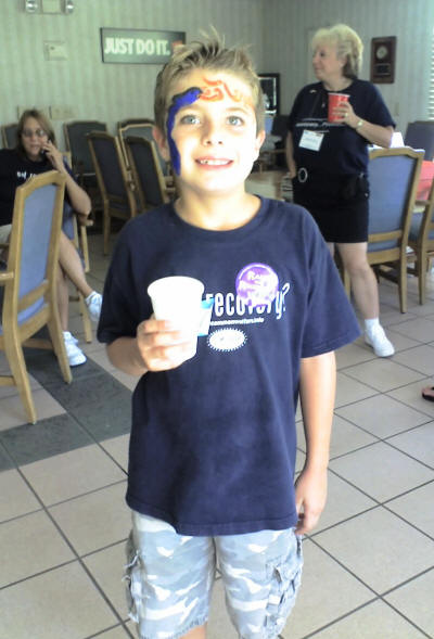 Zach, face-painted and wearing his 'Got Recovery?' T-shirt.