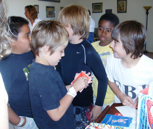 Left to right: Jenny's hair, Chris, Mary (grandma), Zach, Nick, Jason, and Tony.