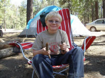 Zach's friend Sam earning his whittling chip.