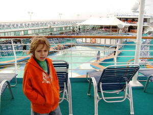 The ship's pools, with the two Jacuzzis in between.