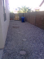 Alongside the house, a potential RV storage location.