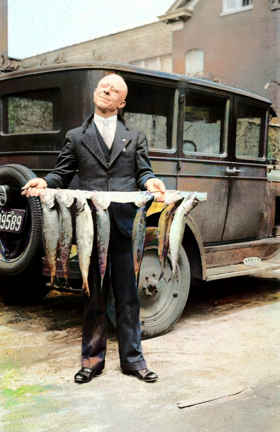 (1900) Great-grandfather Nelson has caught some fish!