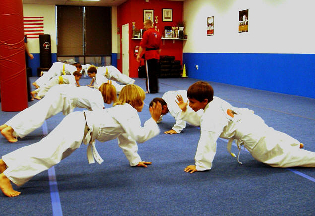 High-fives WHILE doing push-ups. Can Arnold do this?