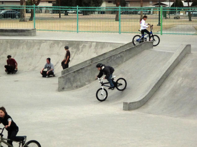 Zach enters the skate park.