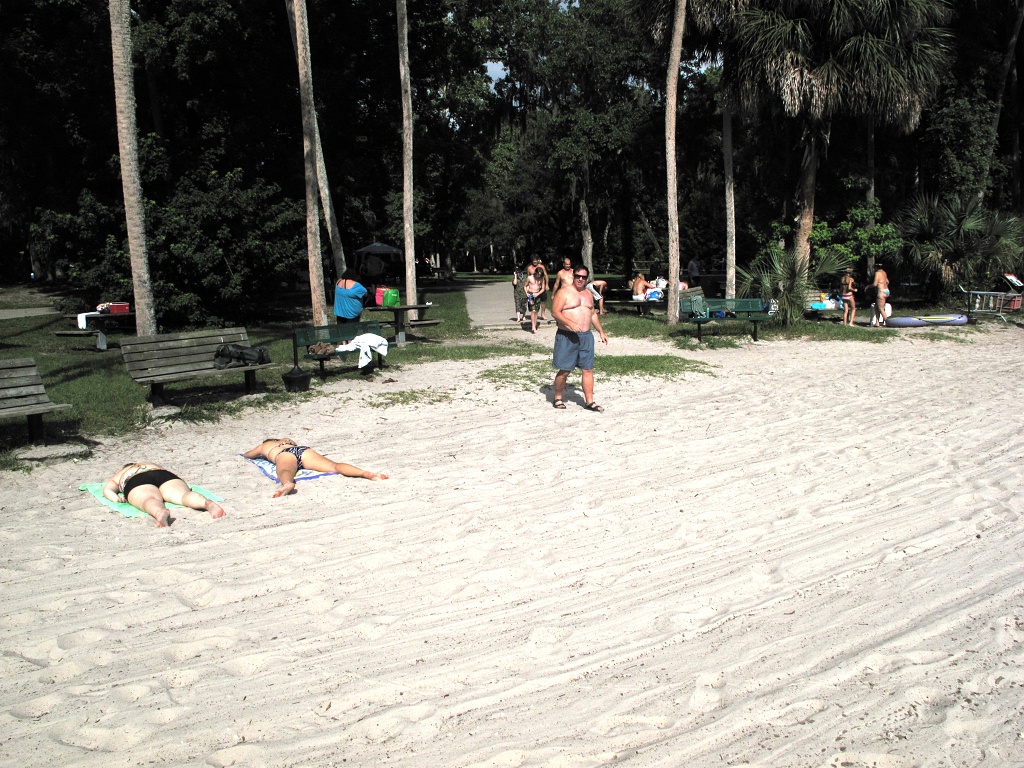 Michael crosses the beach at Alexander Springs.