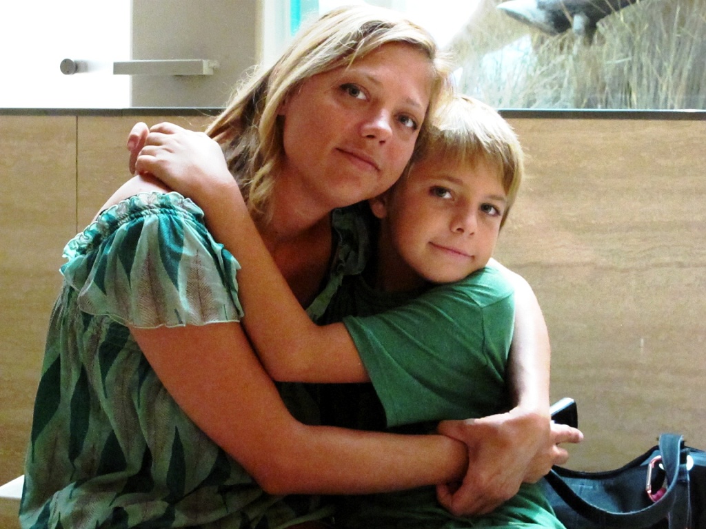 Karen and Zach: A hug break between exhibits.