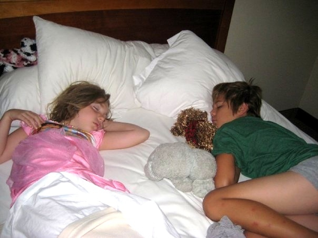 Cailey and Zach, plus assorted stuffed animals.