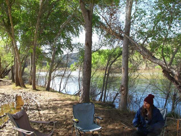 Carl in his camp by the river.