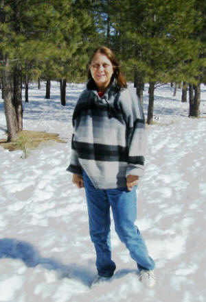 Mary: Stylishly dressed to harmonize with the snow.