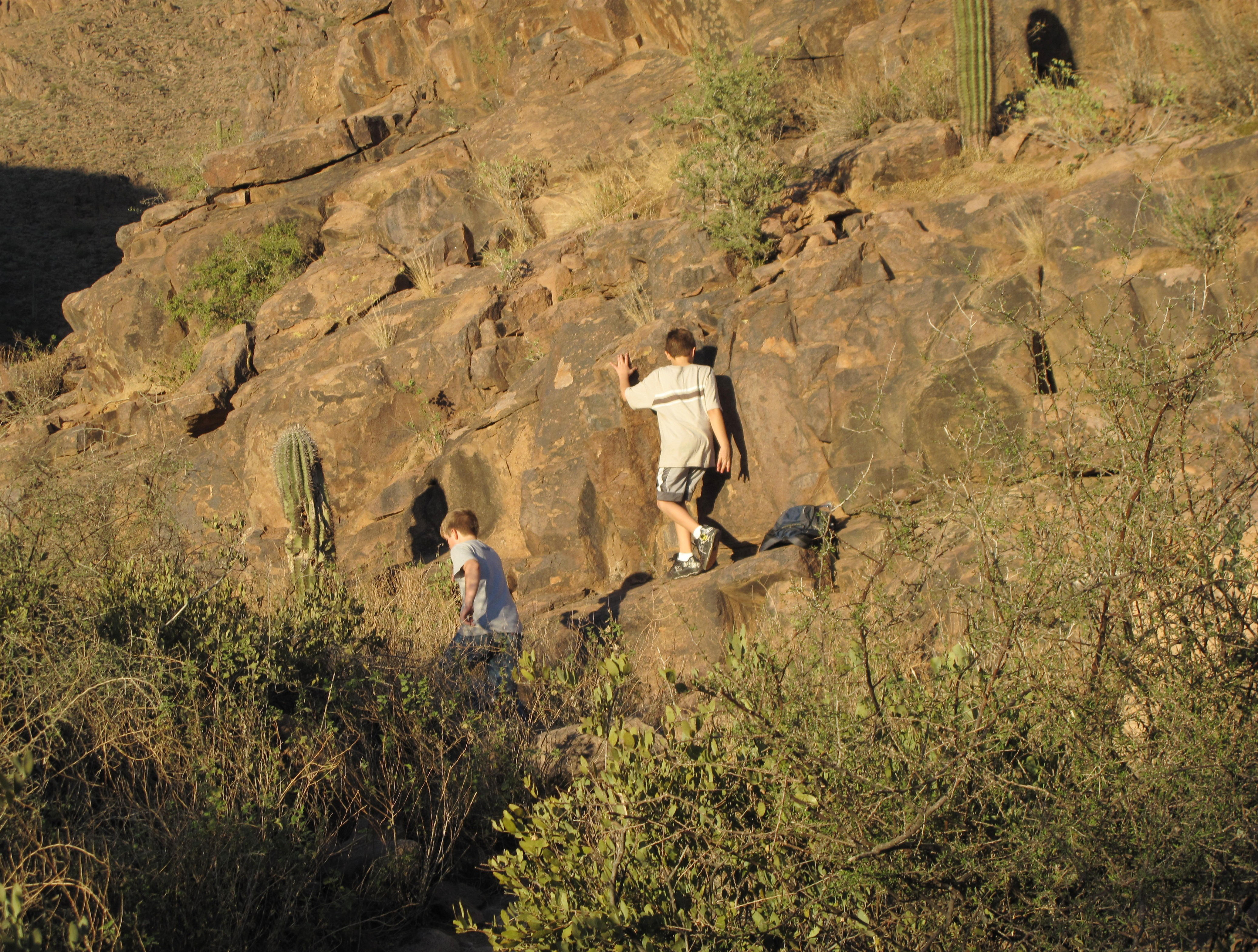 Josh and Zach climb into Hieroglyphic Canyon.