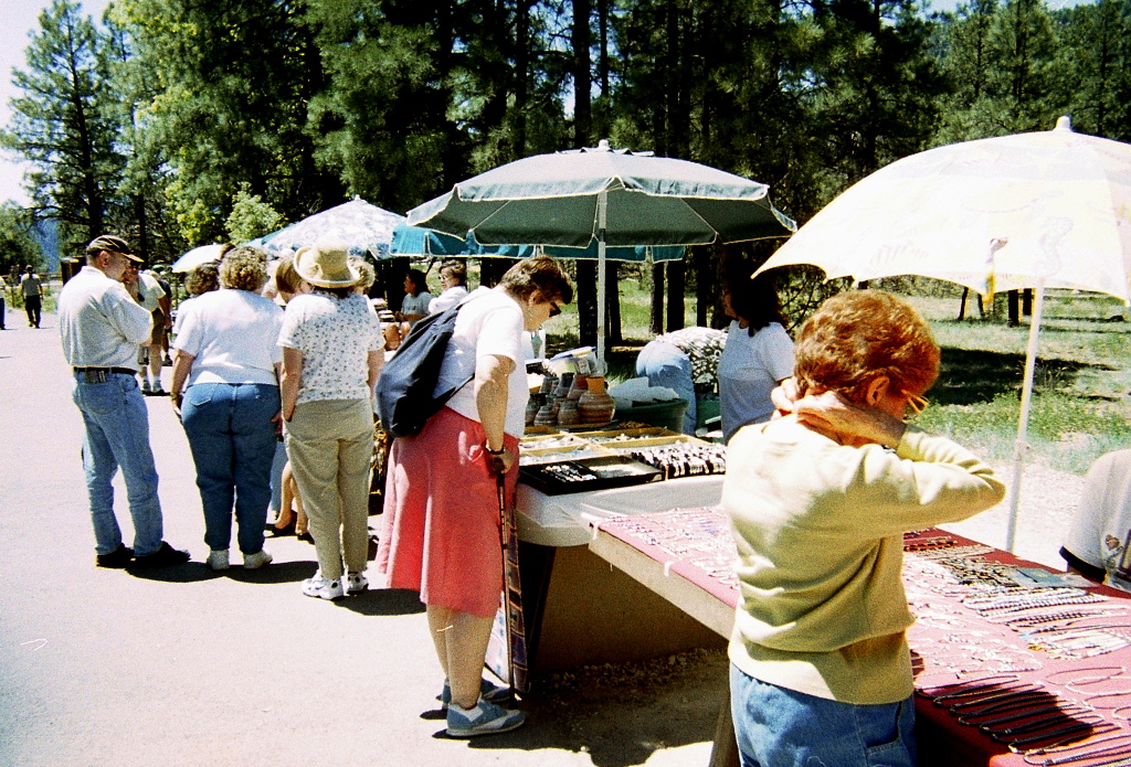 Michael's sister examines Navajo jewelry at the top of Oak Creek Canyon.