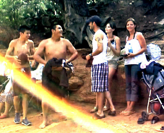 John interacts with the locals.