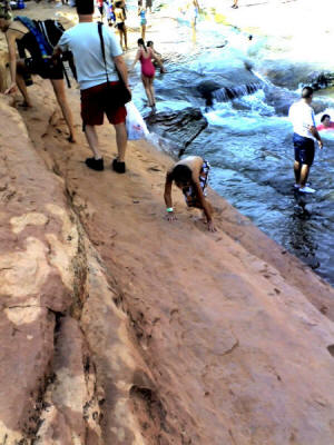 Zach climbs out.
