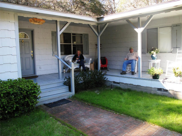 Rummy, Louise and Paul on Louise's front porch.
