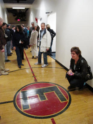 The floor of the old gym remains.