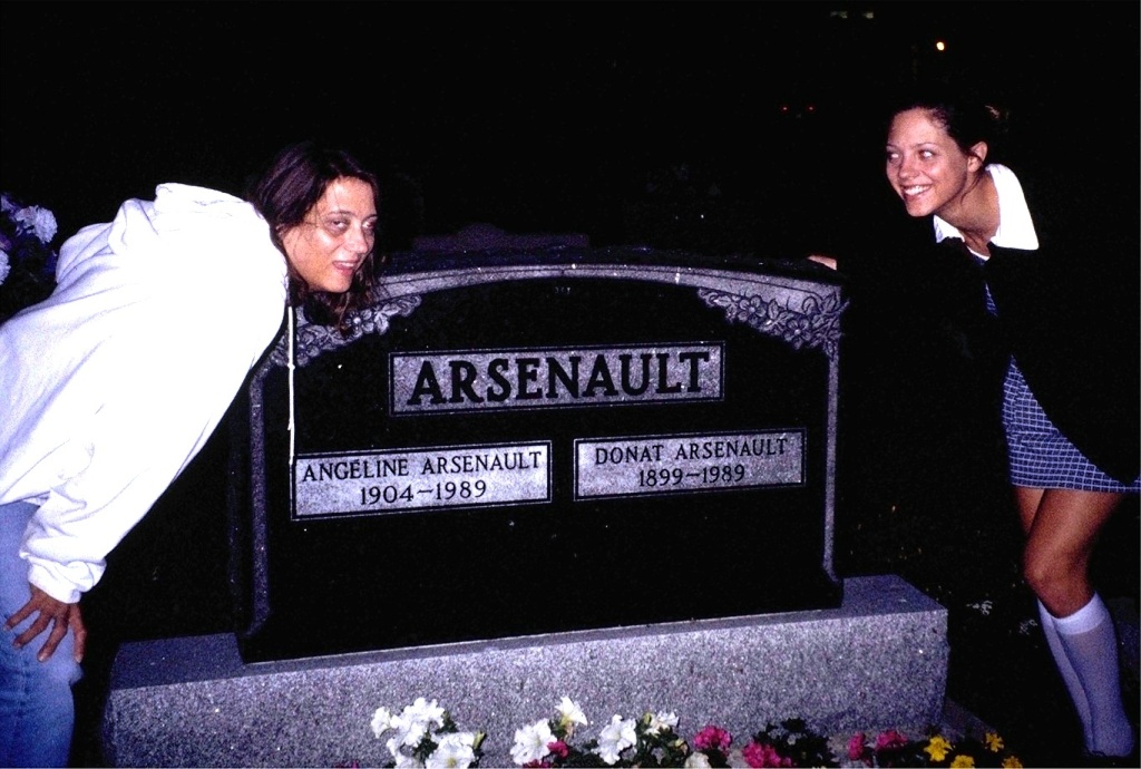 Mary and Karen visit a French Canadian cemetery.