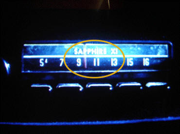 This car radio from Gremlins shows '9-11' on the dial, as well as 